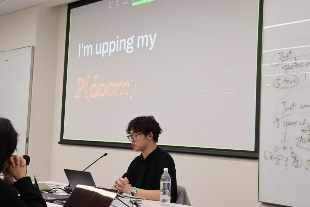 Speaker presenting at the first AI Survival Class